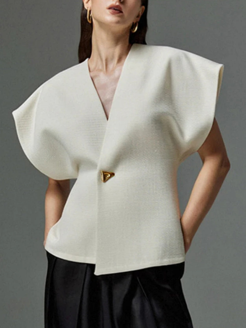 Asymmetric one-button dropped shoulder top